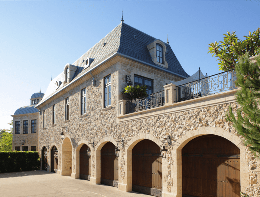 A majestic stone home standing tall, showcasing architectural grandeur and historical significance.